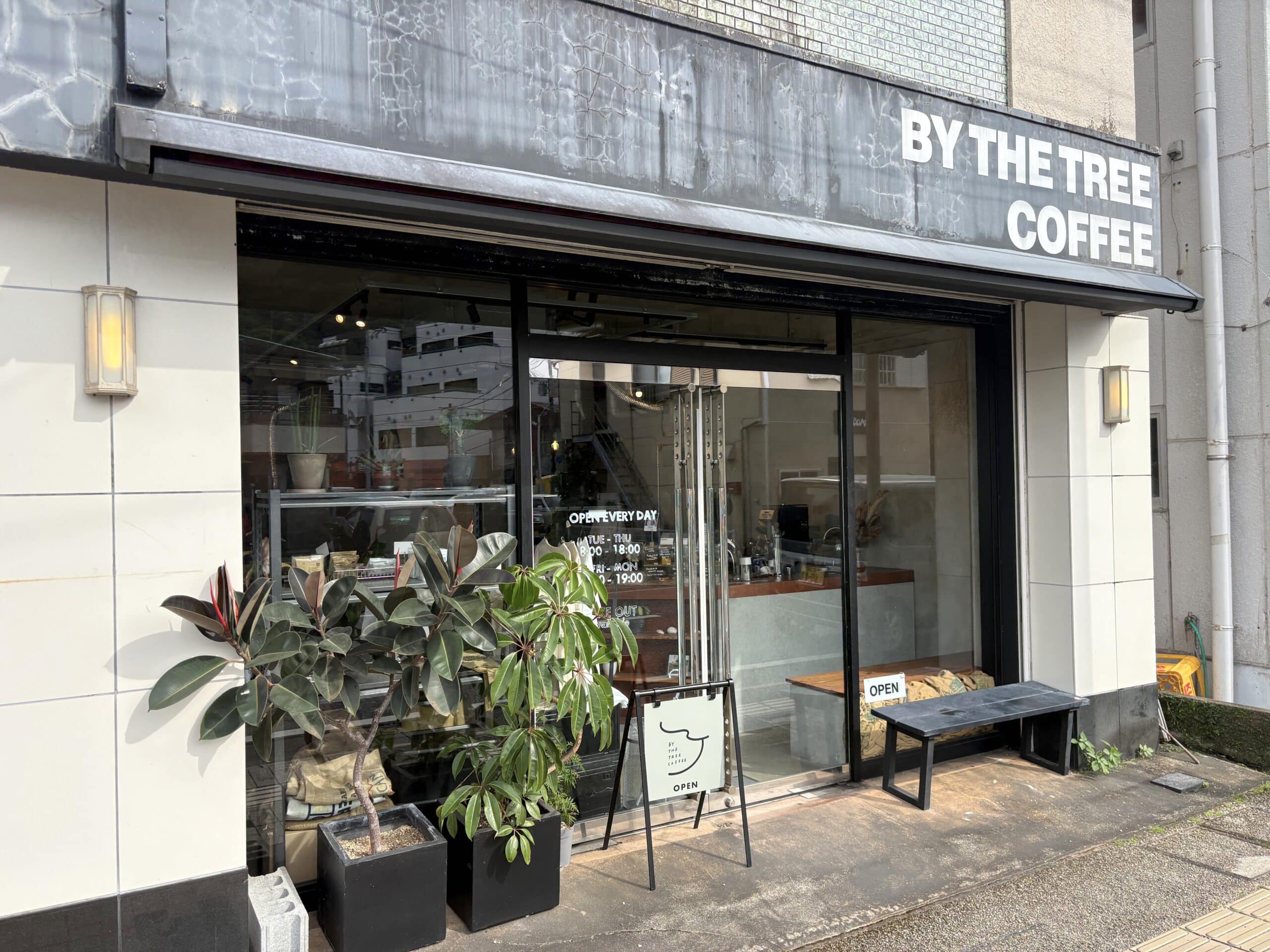 Exterior of By The Tree Coffee, a modern café in Amami City