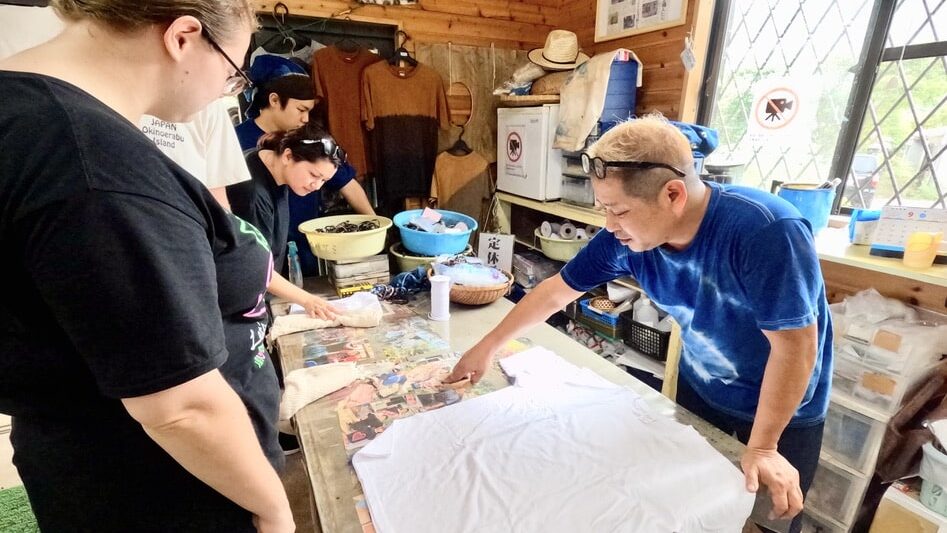 Learning traditional mud-dyeing patterns from a skilled artisan in Amami Oshima