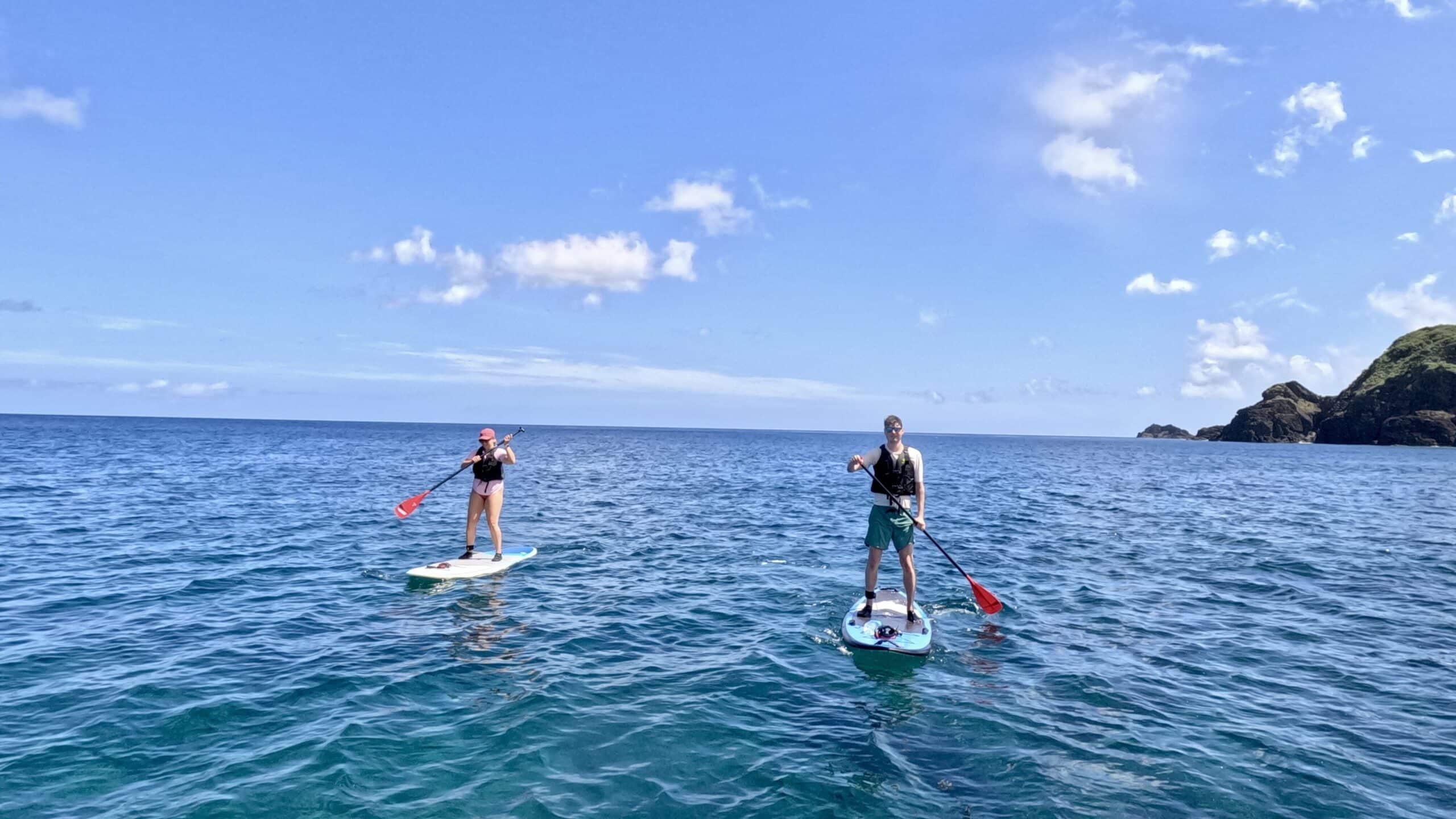 Stand-up paddleboarding on the crystal-clear ocean of Amami Oshima