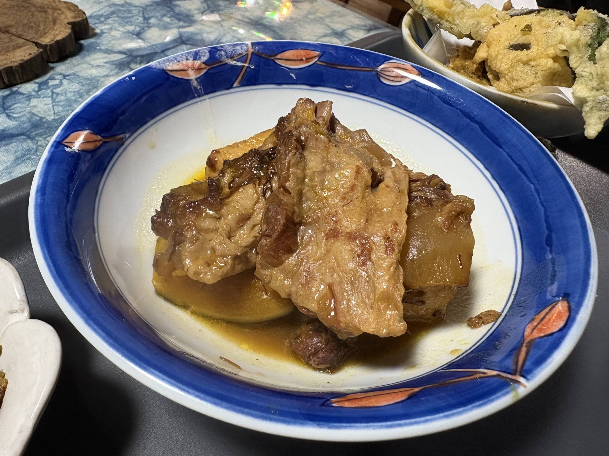 Nankotsu (wan-hone), slow-simmered pork ribs in brown sugar sauce, a classic dish of Amami cuisine